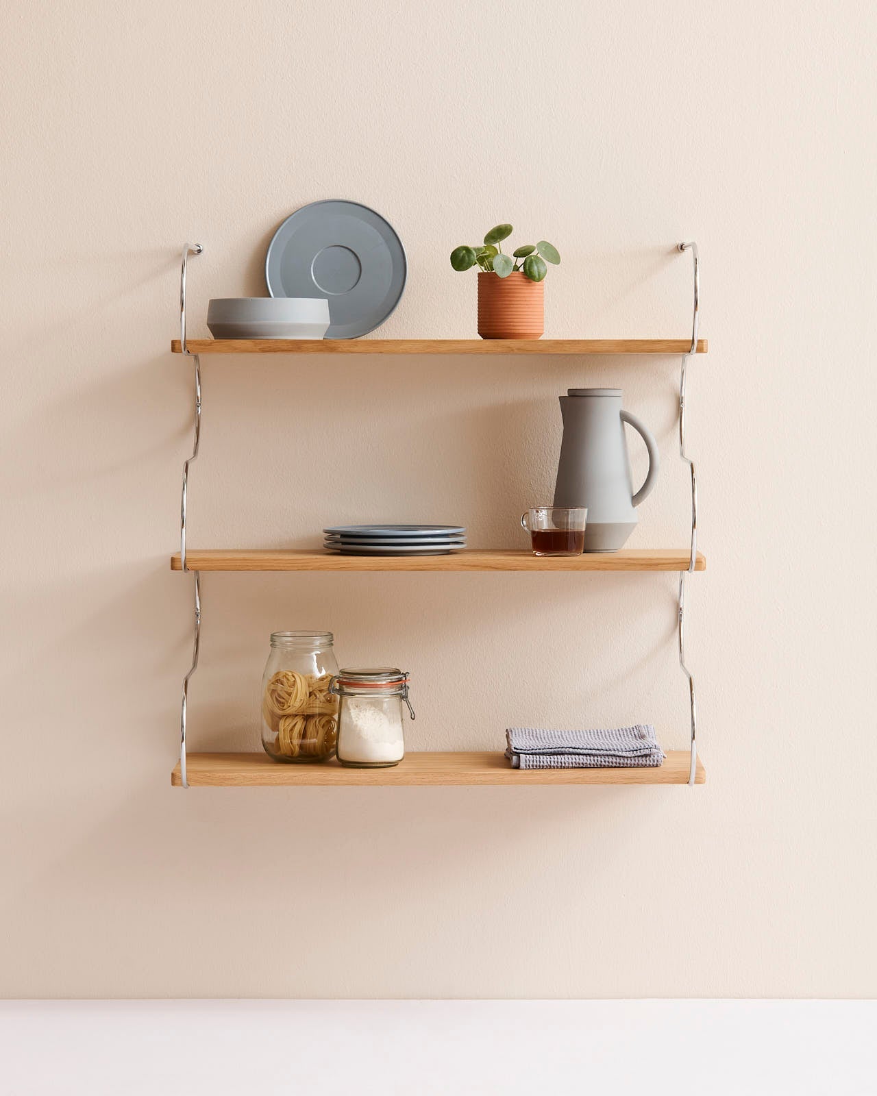 Onda small - libreria in rovere e acciaio cromato