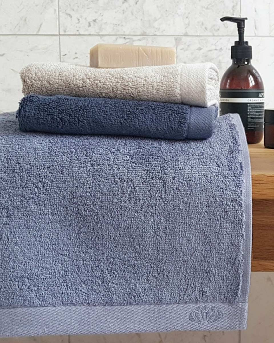 Abbinamento asciugamani crema con azzurro