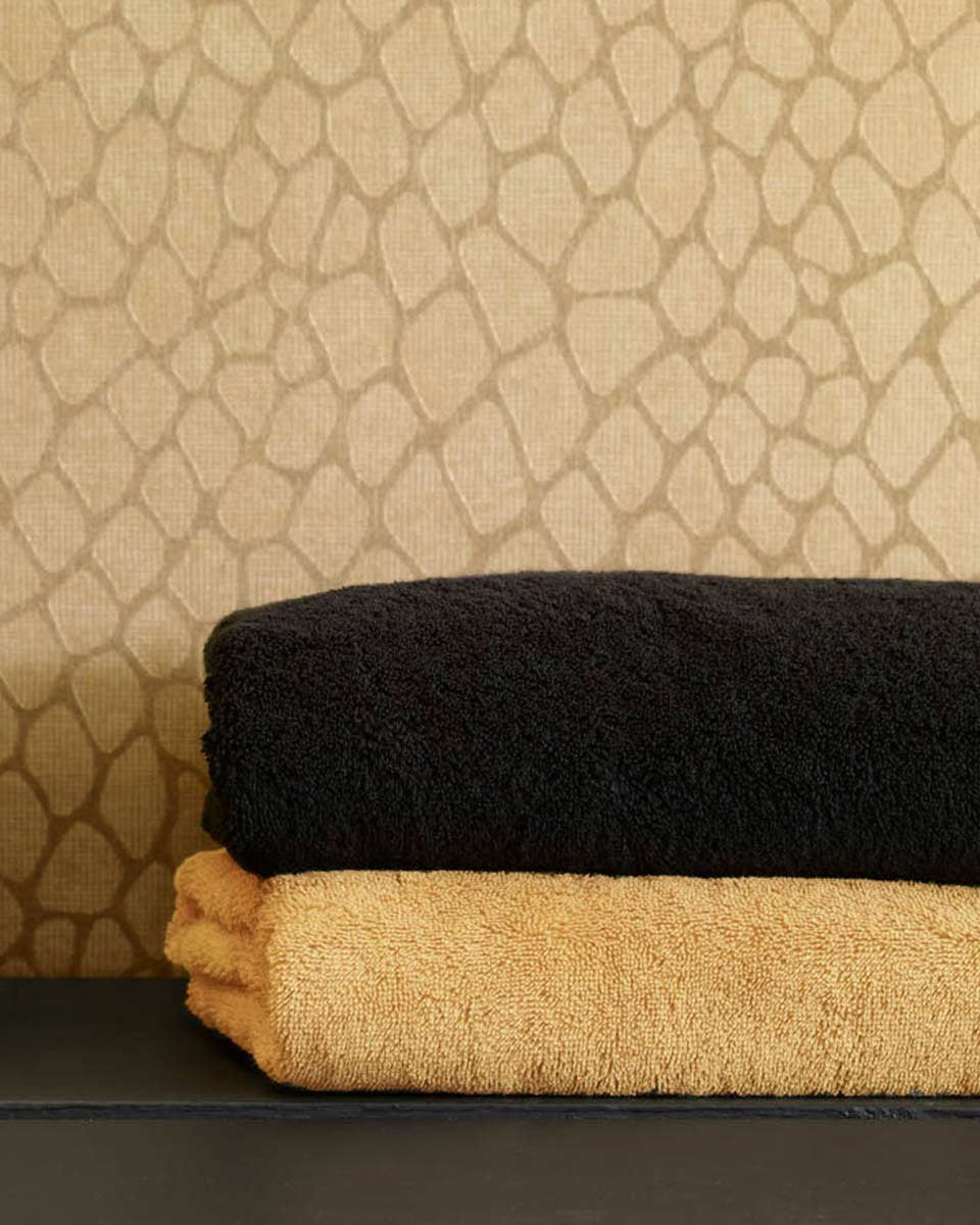 Asciugamani di lusso per avvolgerti in una morbida spugna