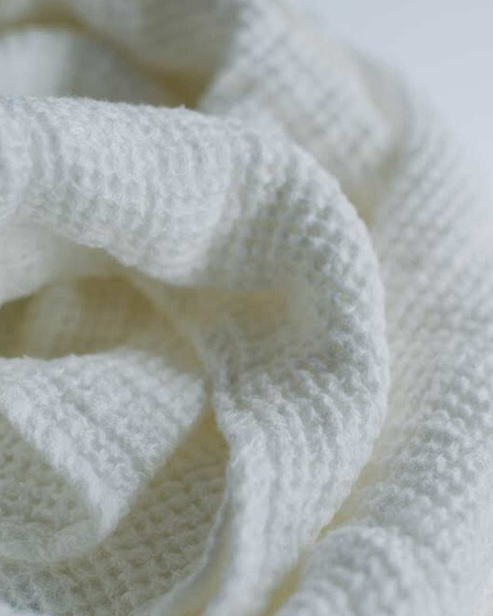 Asciugamano bianco in lino nido ape 