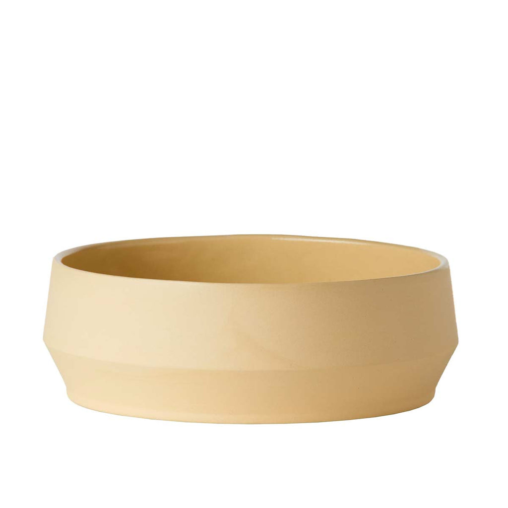 Ciotola gialla di design realizzata in ceramica dalle tenui tinte pastello