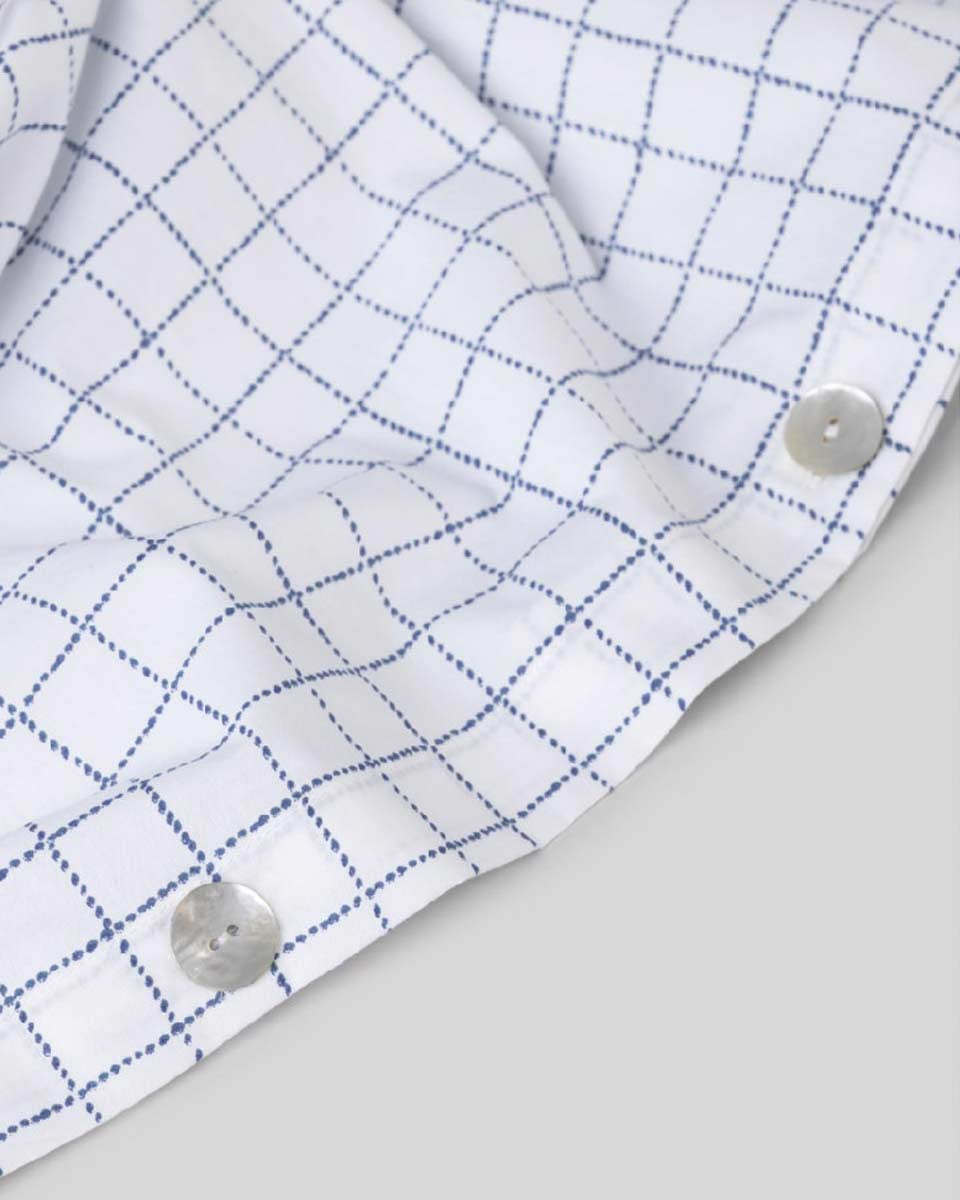 Copripiumino bianco a quadretti blu