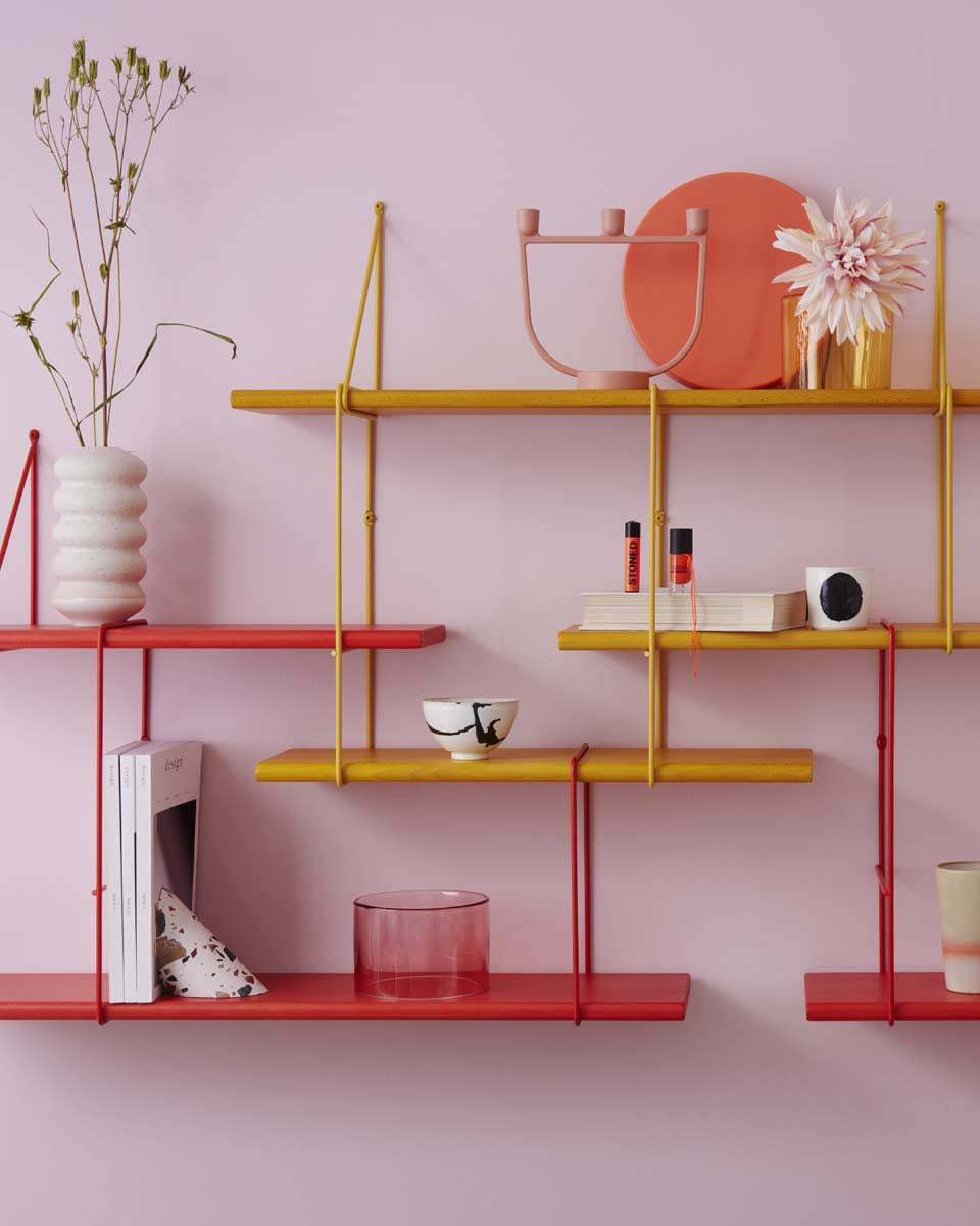 Abbina la libreria rossa Shrink a quella giallo Curry della stessa linea