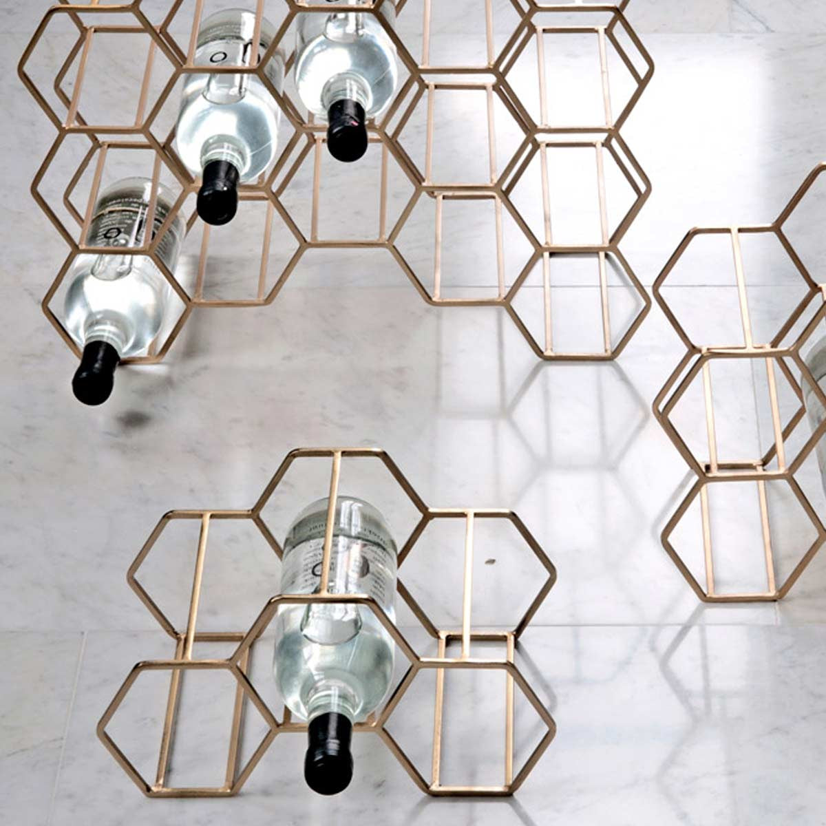 Portabottiglie moderno in metallo finitura ottone