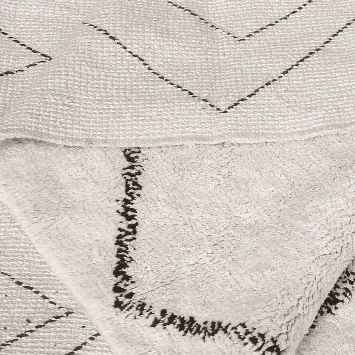 Tappeto in cotone con motivo geometrico