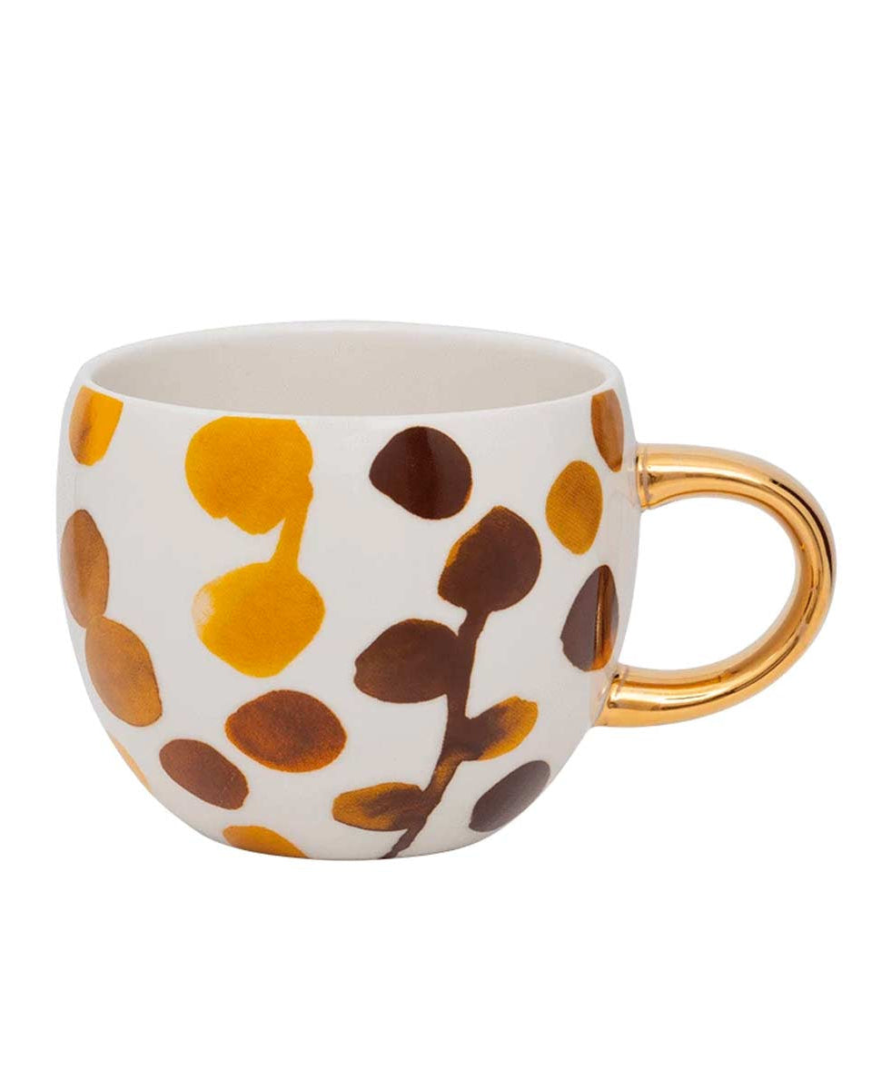 Tazza con grandi pois dipinti e manico dorato