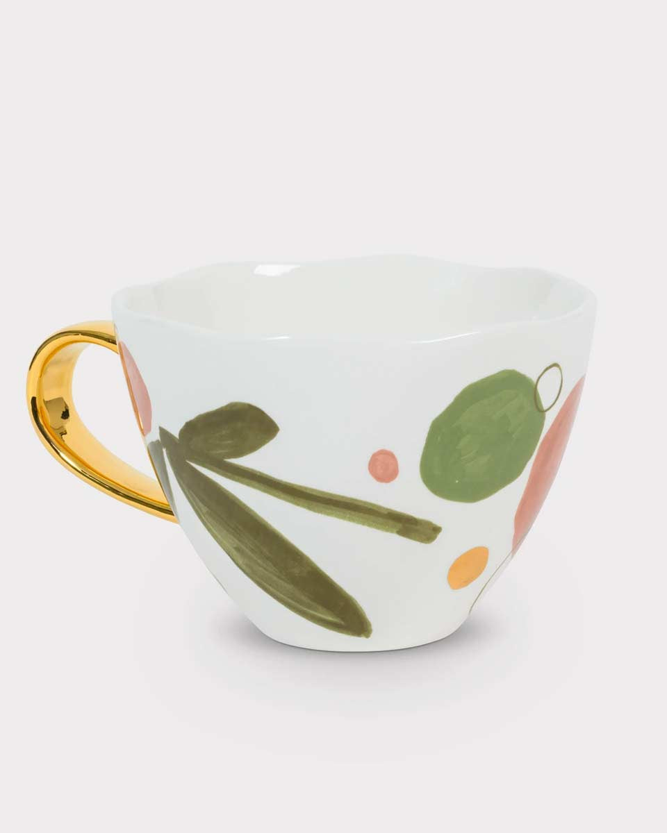 Tazza decorata con fiori e manico dorato