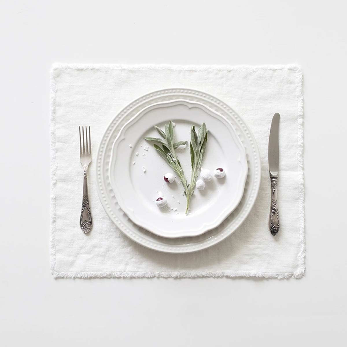 Tovagliette in lino bianco con frange