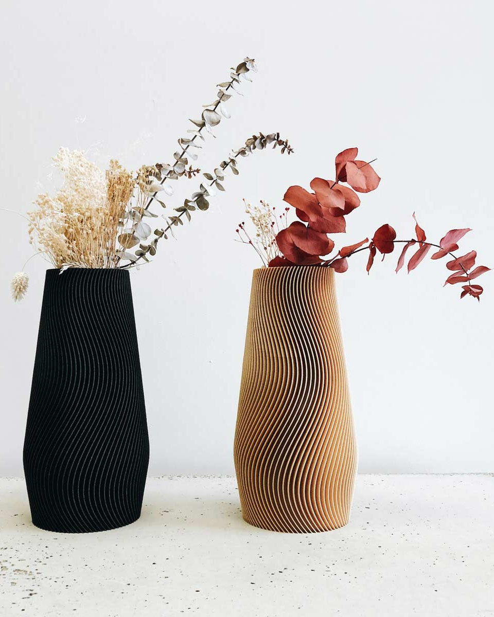 Abbina questi vasi di design nelle due versioni di colore