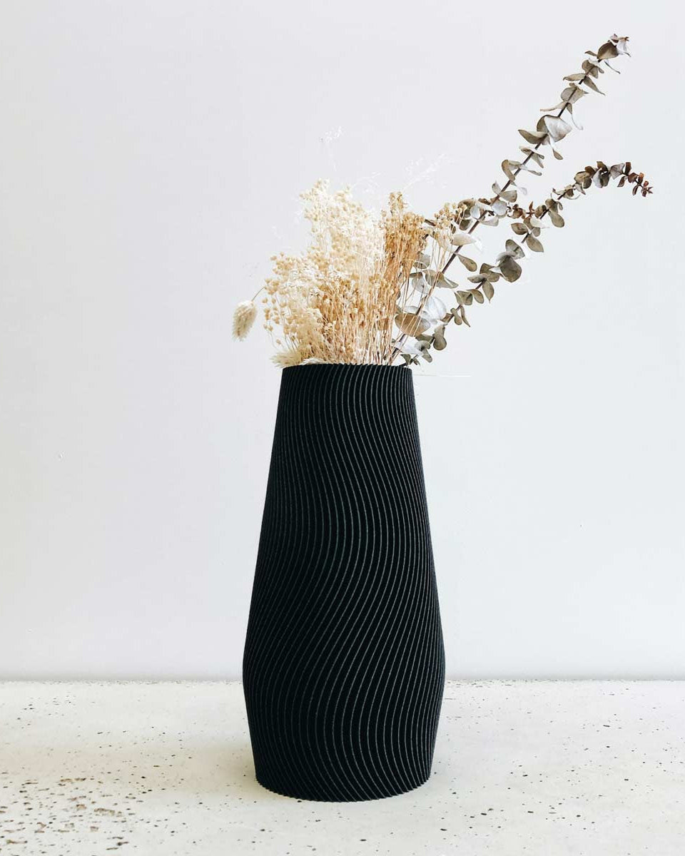 Vaso elegantee originale nero con motivo a onde