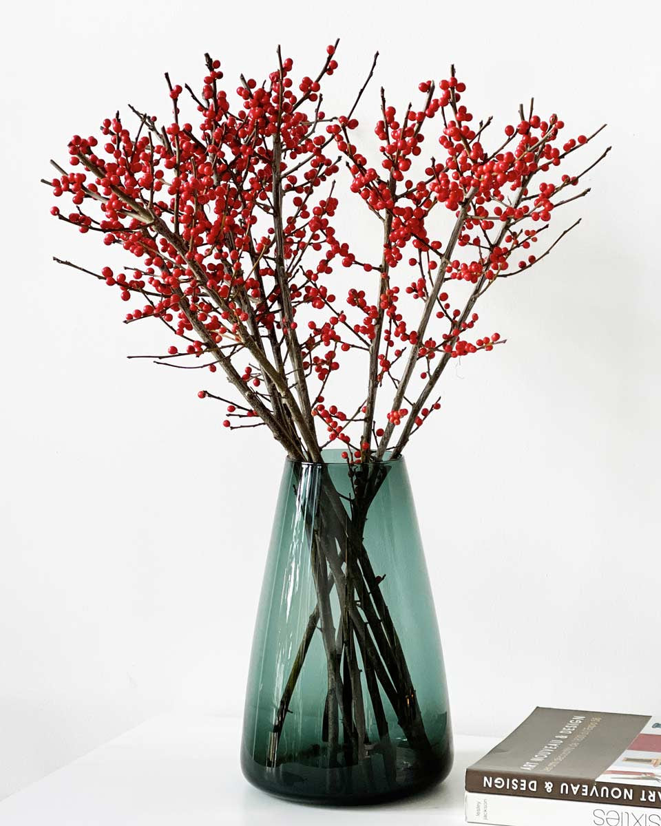 Vaso in vetro soffiato verde scuro con texture liscia