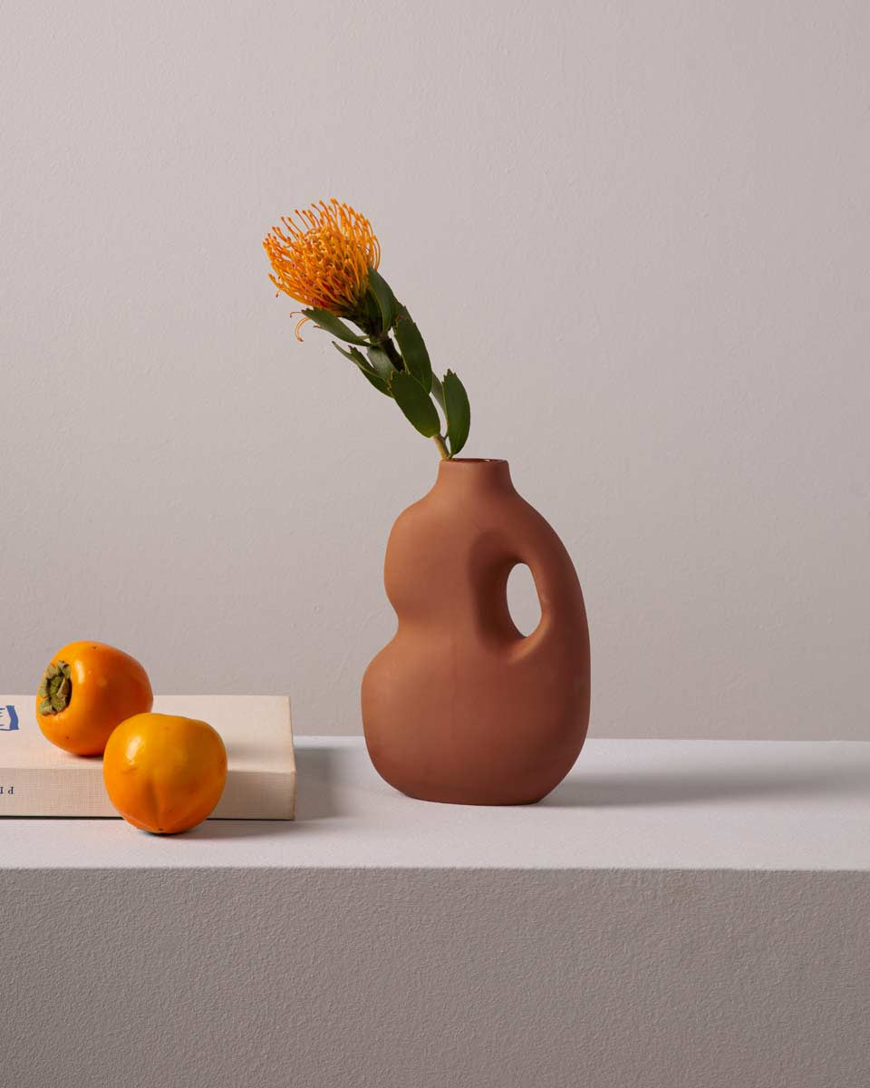 Vaso decorativo in ceramica rosso ruggine